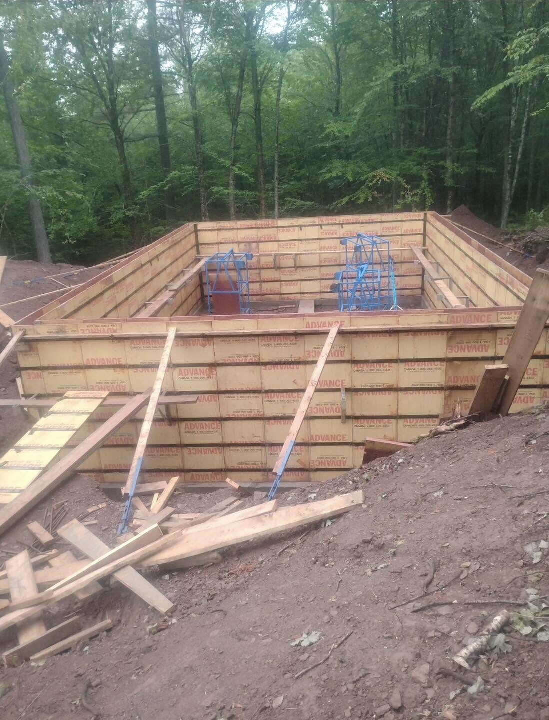 Cabin foundation on a wooded Grand Lake lot